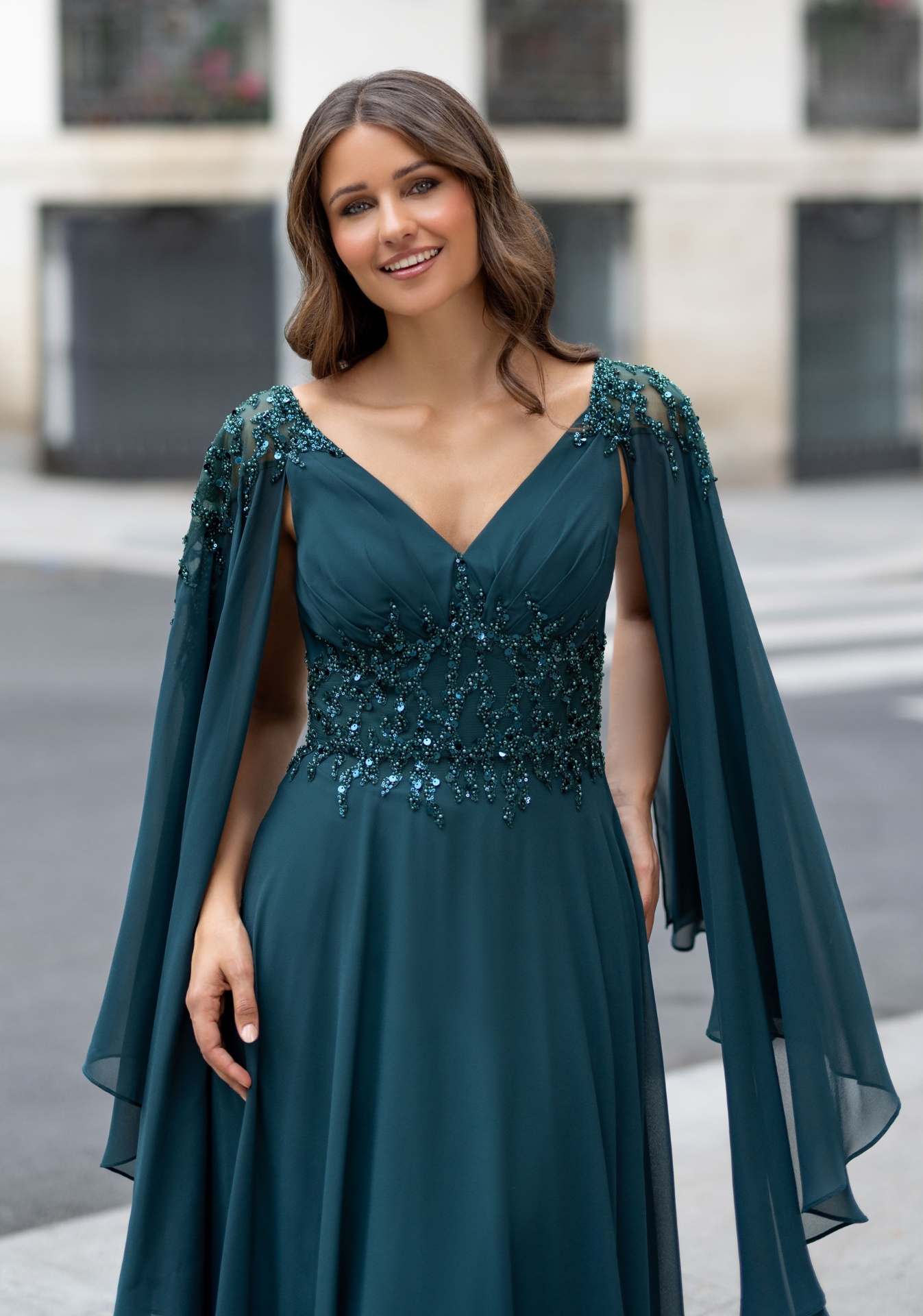 Woman wearing Style 1099 Botanical Green evening dress — bodice detail