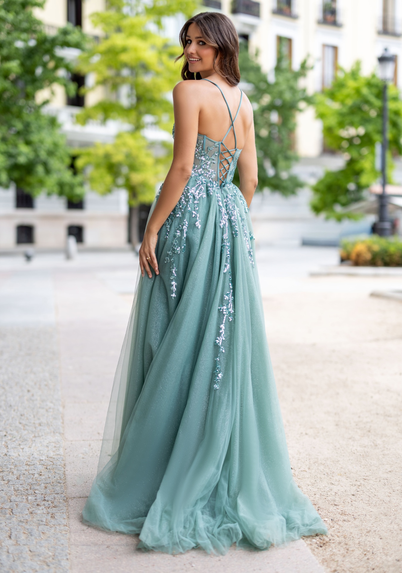 Woman wearing Style 1037 Glitter Sterling Blue evening dress — back view